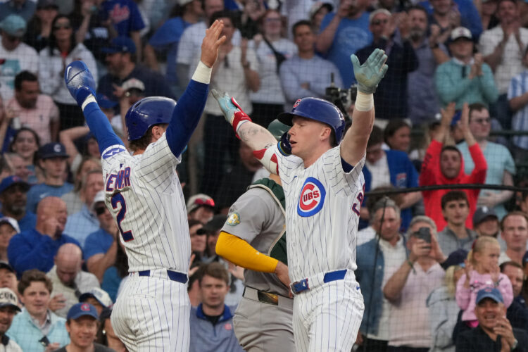 Kurtz drives in winning run in 10th as A's beat Cubs 5-4; Chicago's Happ reaches 1,000 career hits